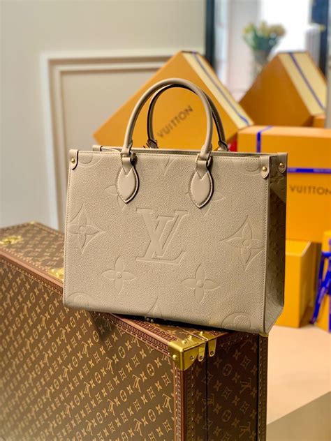 Louis Vuitton beige bag